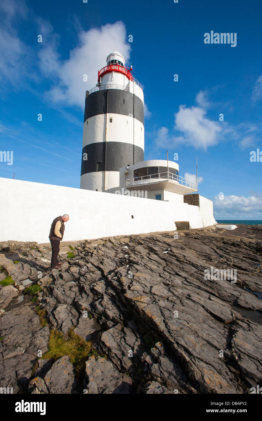 Gancho Gancho faro situado en cabeza es uno de los faros más antiguos del mundo en contar Wexford Foto de stock