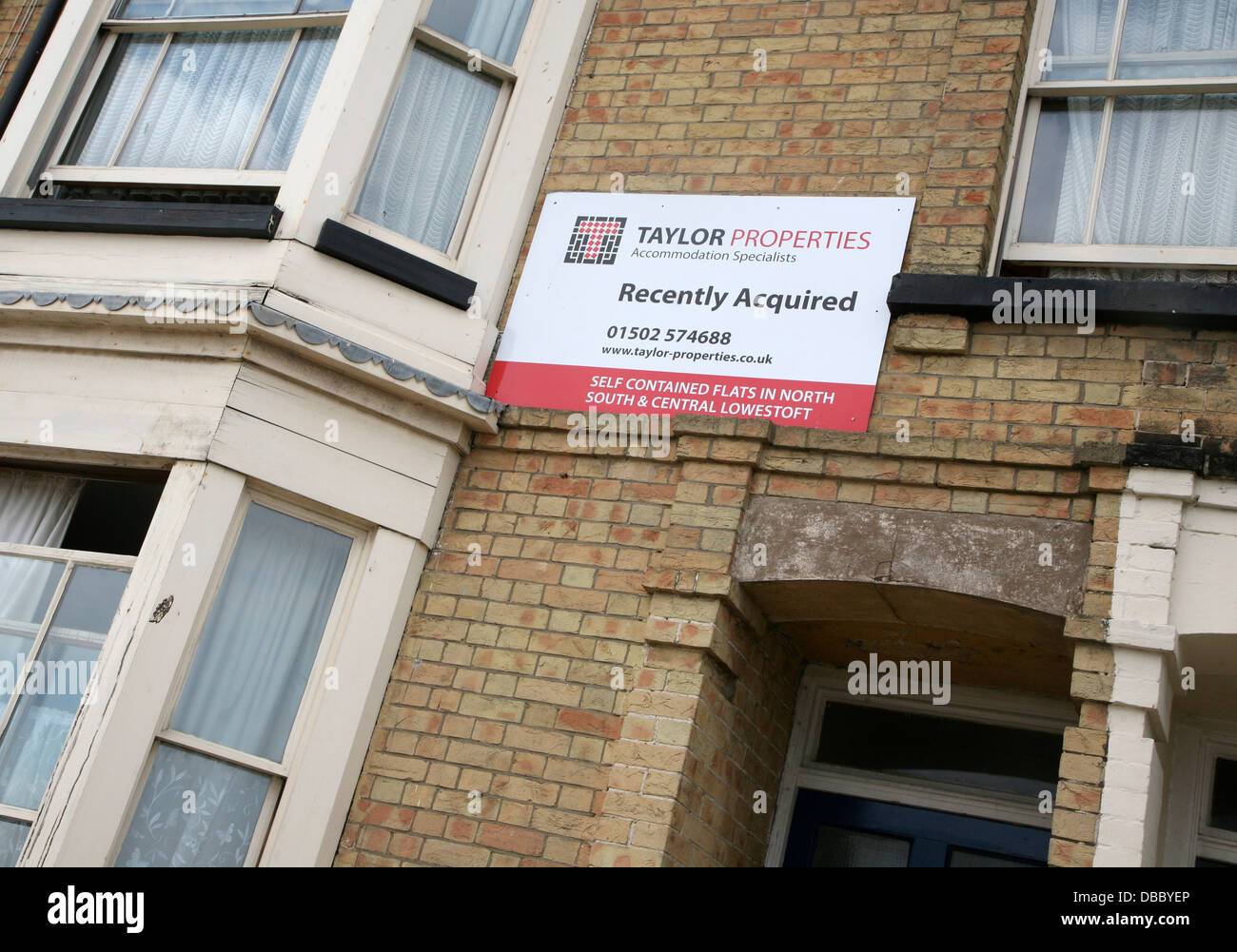Signo de desarrollo de propiedad recientemente adquirida Lowestoft Suffolk Inglaterra Foto de stock