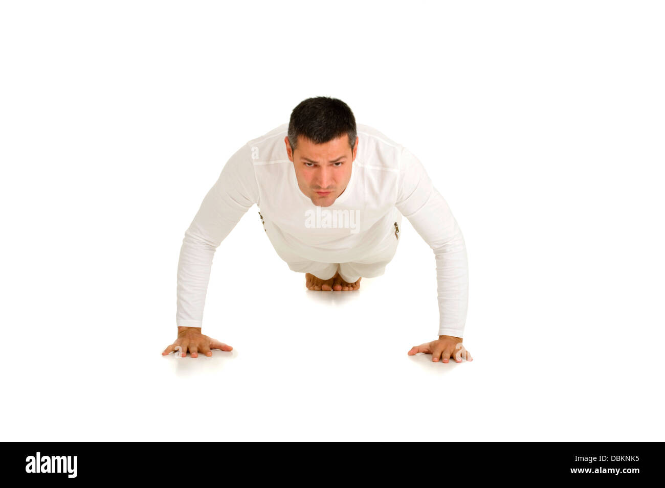 Hombre de blanco no push-ups Foto de stock