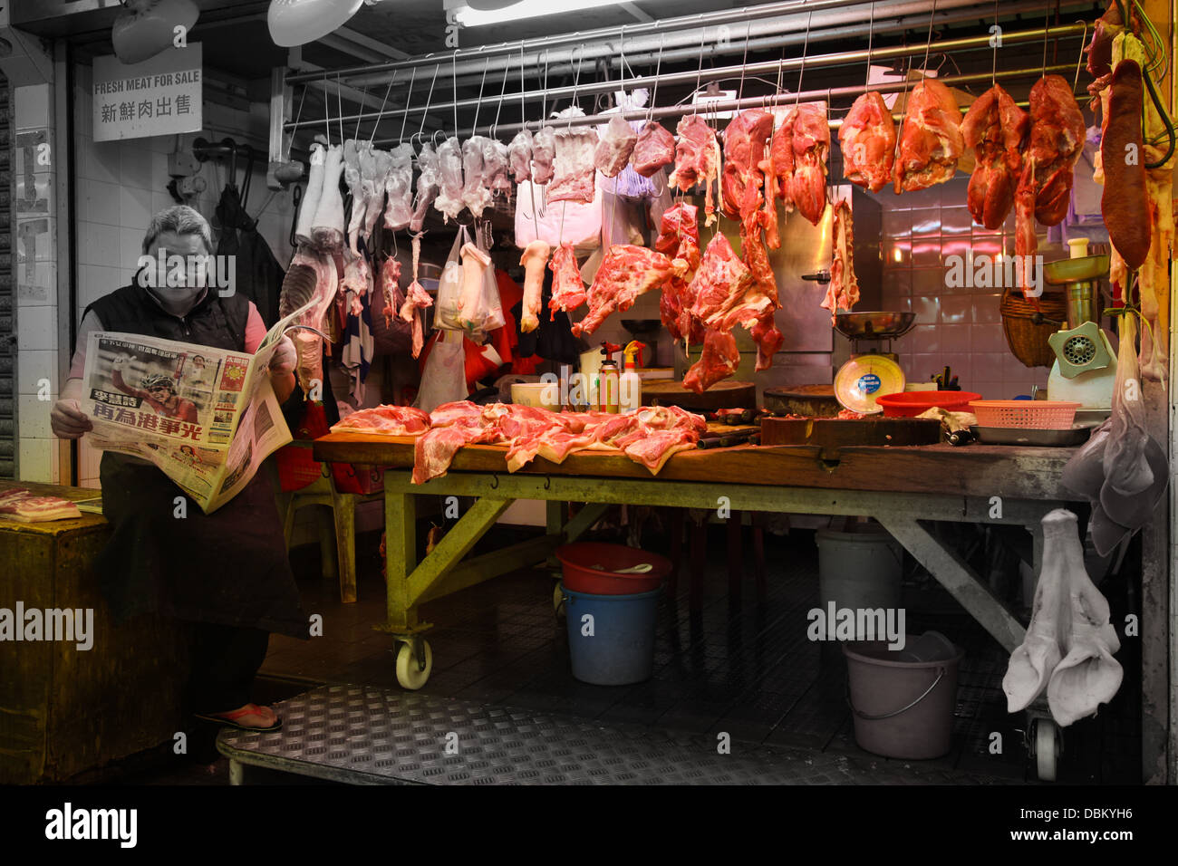 Los carniceros del mercado chino de calado mercado carnicero Foto de stock