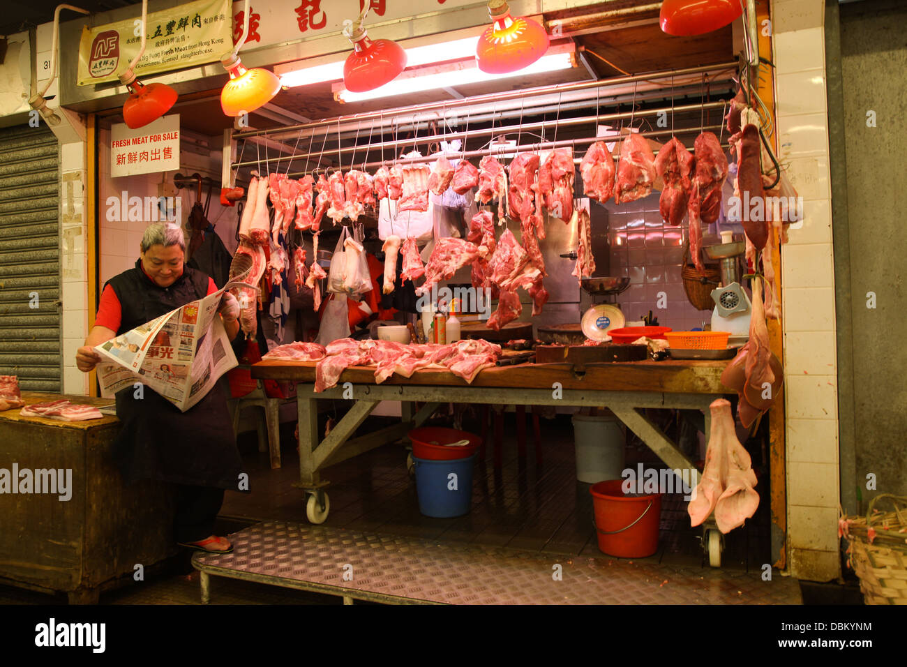 Los carniceros del mercado El mercado chino de calado Foto de stock