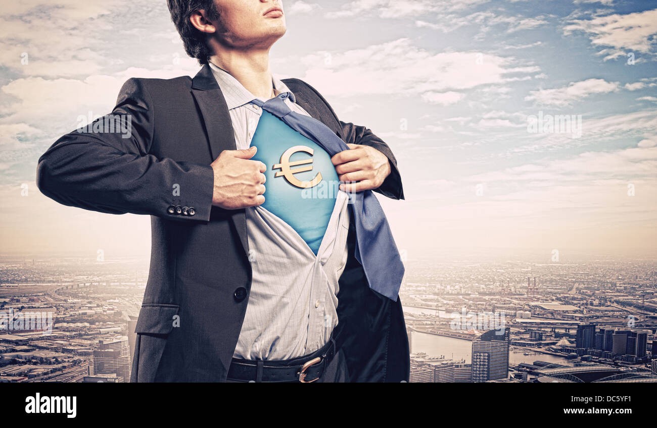 Hombre de negocios tira camiseta Superman camiseta aparte mostrando bajo  Fotografía de stock - Alamy