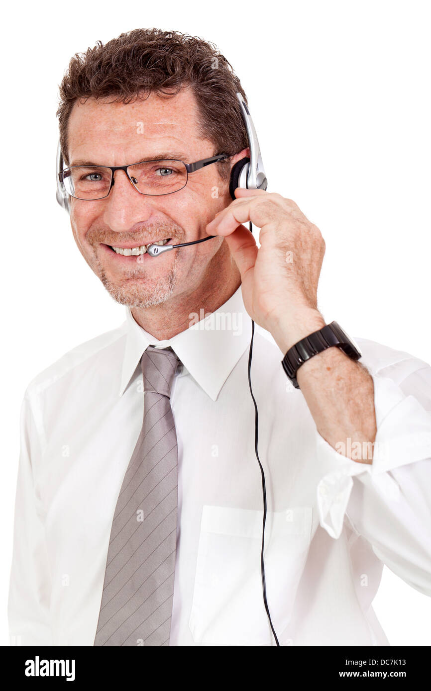 Operador masculino maduro empresario sonriente con auriculares llamada senter helpdesk Foto de stock