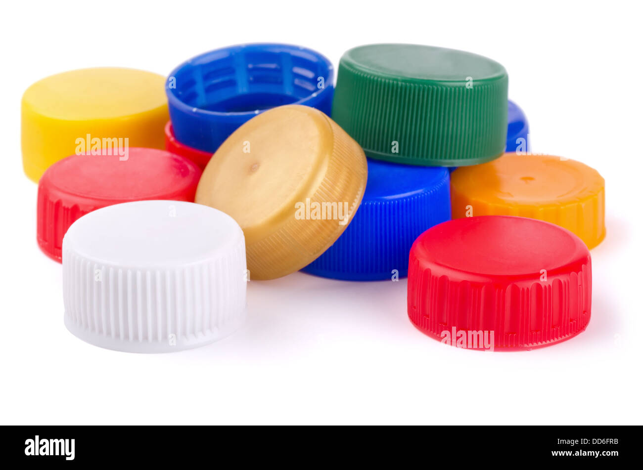 Tapones de rosca de botella de plástico aislado en blanco Fotografía de  stock - Alamy
