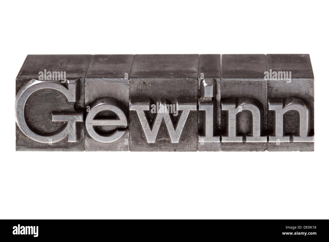 Antiguas letras de plomo que forman la palabra "Gewinn', Alemán con fines de lucro Foto de stock