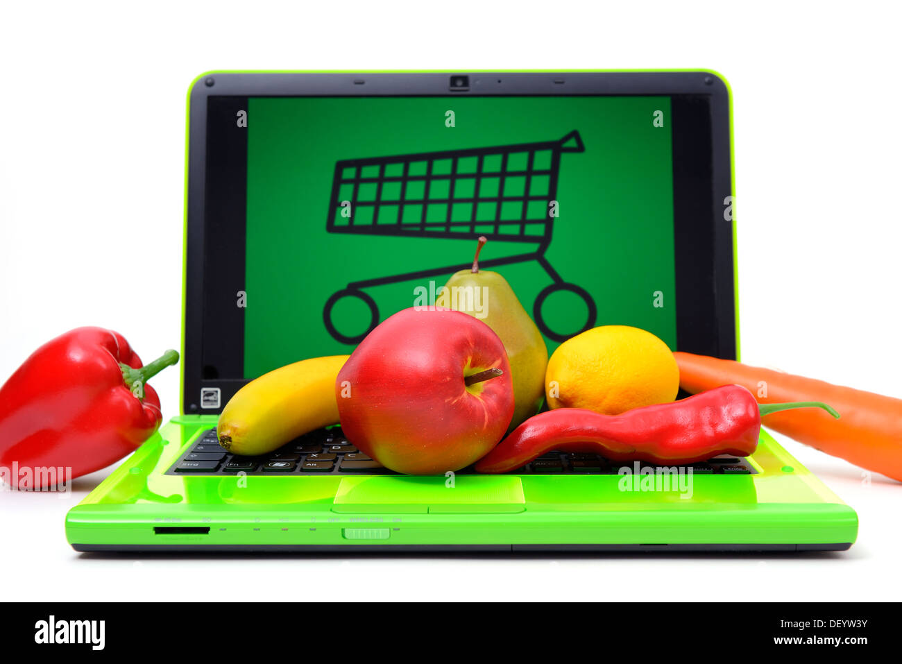 Fruta de una laptop por compras, compras en línea de comida, Obst auf einem portátil del MIT, Onlineshopping Einkaufswagen von Lebens Foto de stock