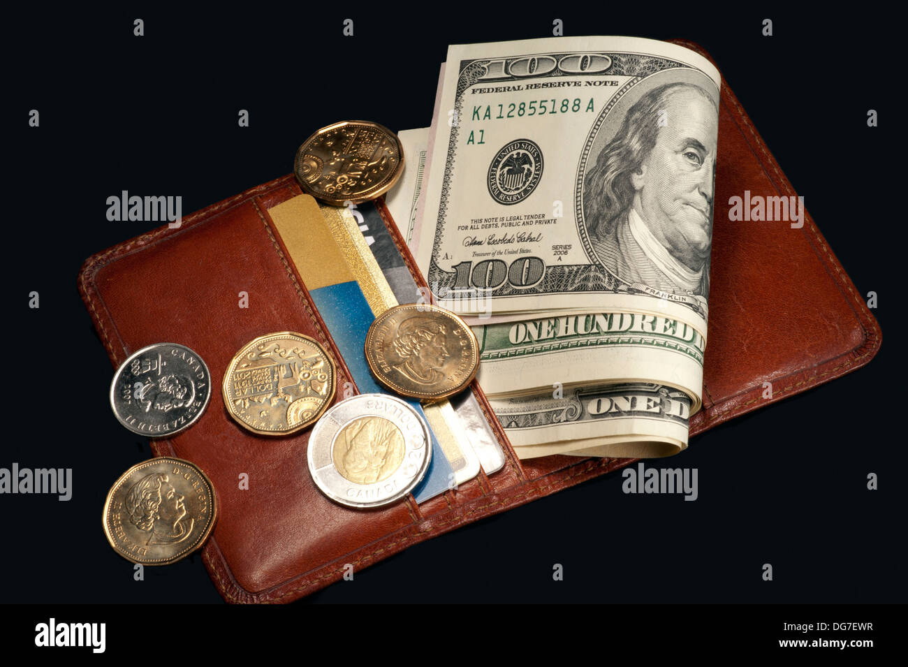 Dinero y monedero Foto de stock