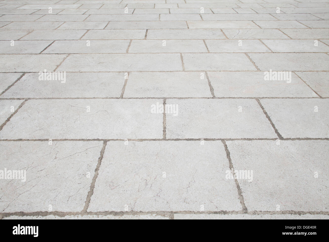 Pavimento de piedra laja blanca o gris de fondo textura de mosaico Foto de stock