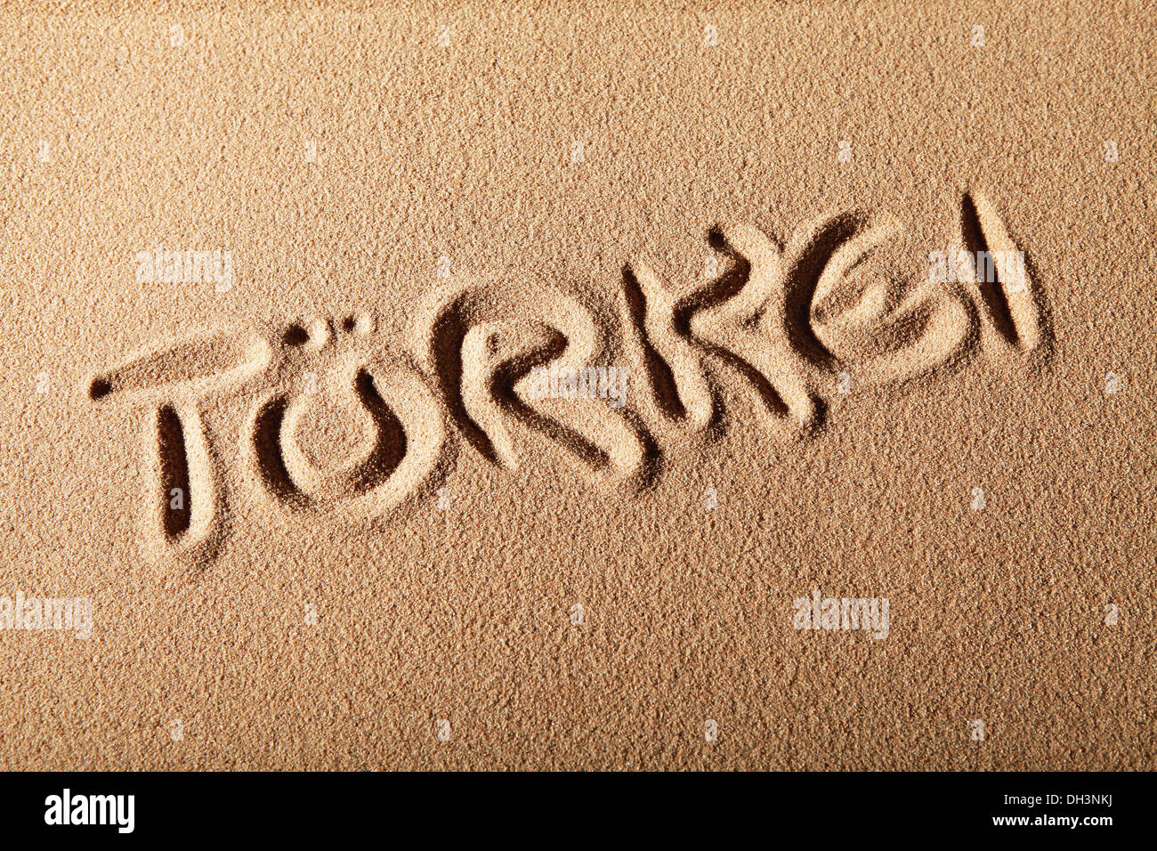 Escrito en la arena "TÜRKEI' o 'Turquía' Foto de stock