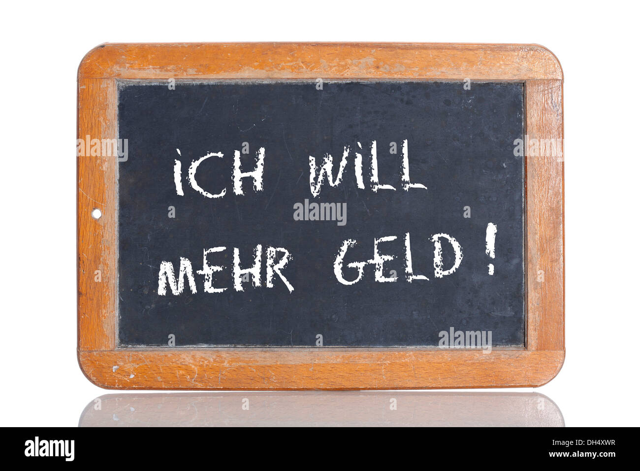 La vieja escuela pizarra con las palabras "Ich will MEHR GELD!, Alemán para Quiero más dinero! Foto de stock