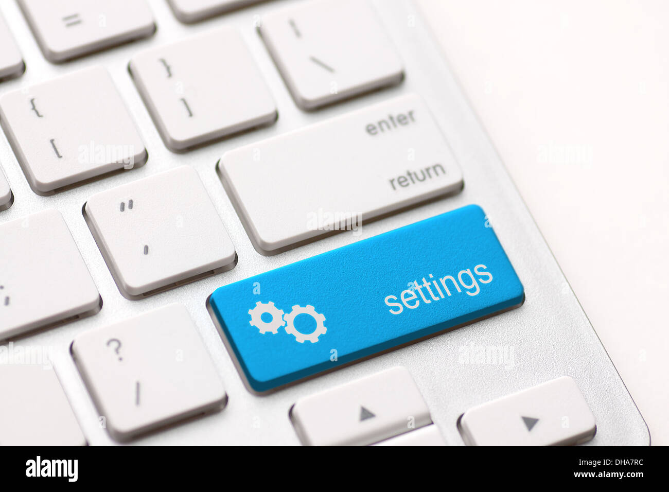 Servicio clave del botón enter en el teclado blanco Foto de stock