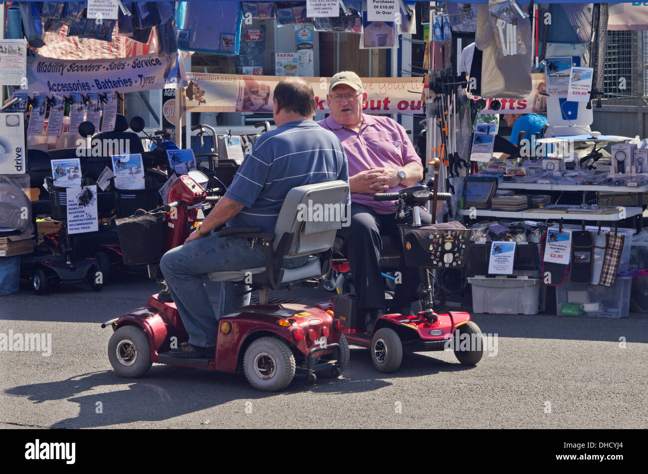 Día de mercado mobility scooter rally. Foto de stock