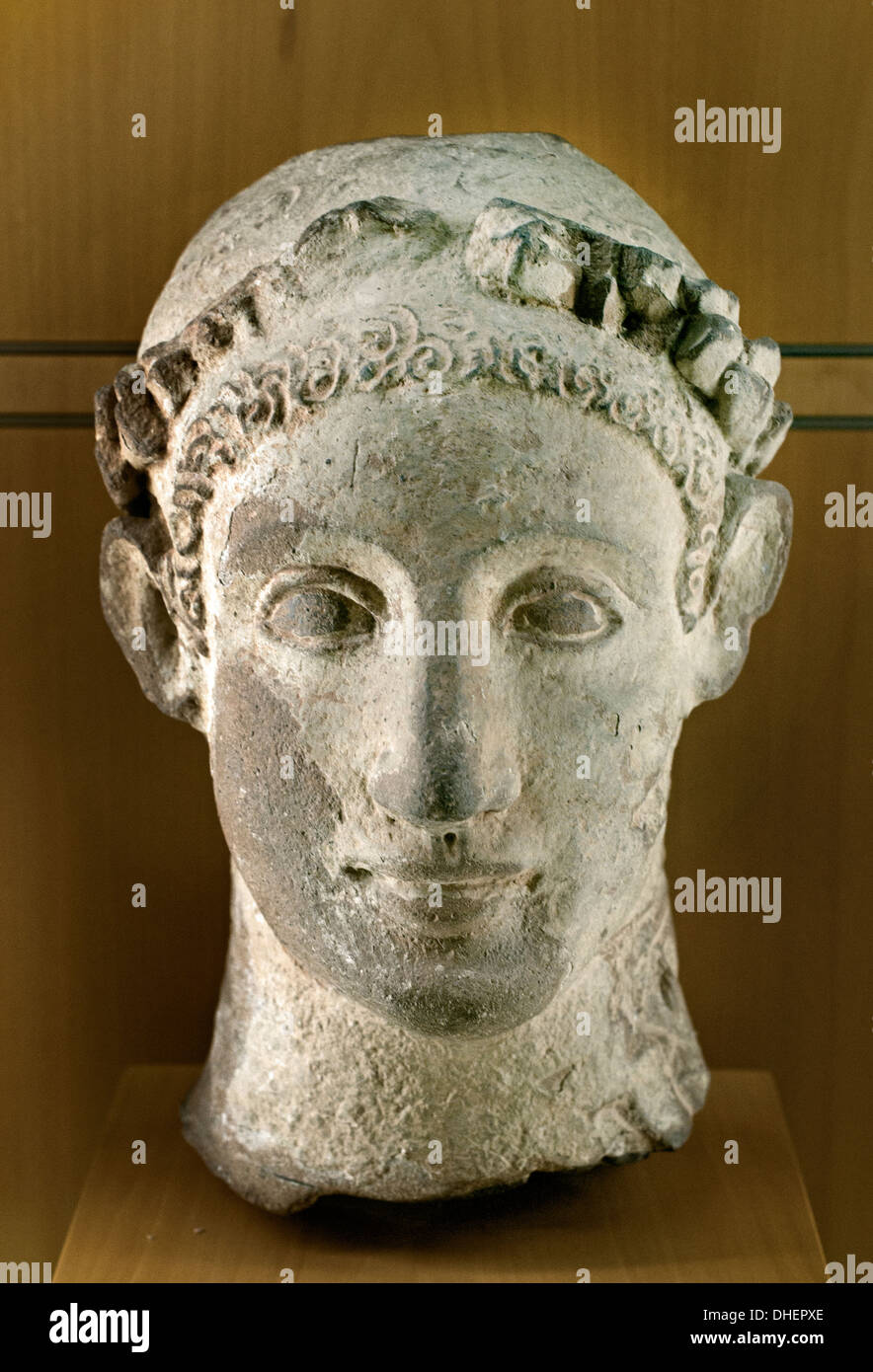 Cabeza de un hombre joven 325 A.C. época Helenística Griega de Chipre Grecia Foto de stock