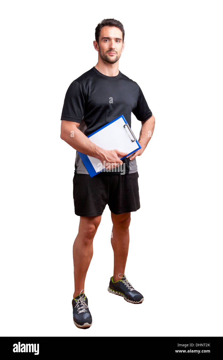 Entrenador personal, con una almohadilla en su mano, aislados en blanco Foto de stock