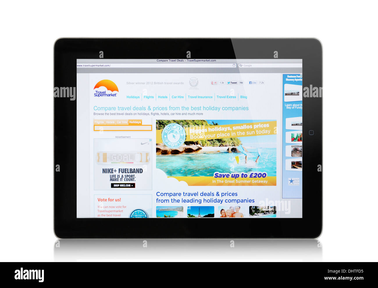 Sitio web sobre iPad pantalla TravelSupermarket Foto de stock