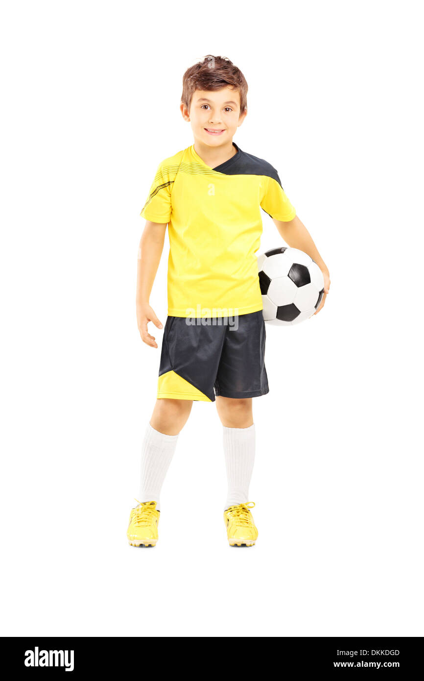 Longitud total retrato de un niño en ropa deportiva sosteniendo un balón de fútbol Fotografía stock - Alamy