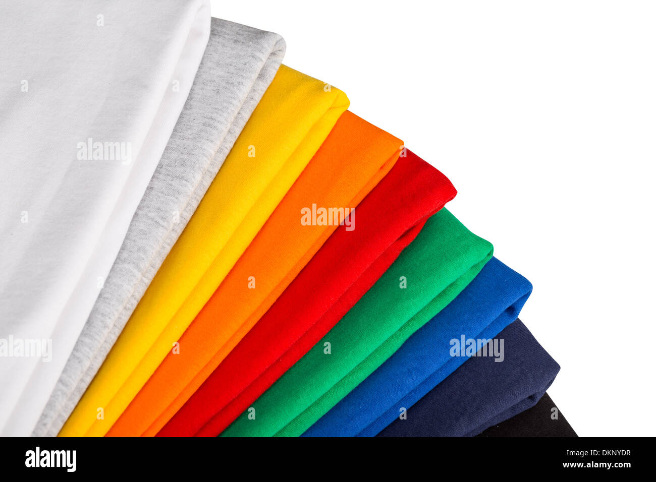 Pila de camisas de algodón colorido aislado Foto de stock