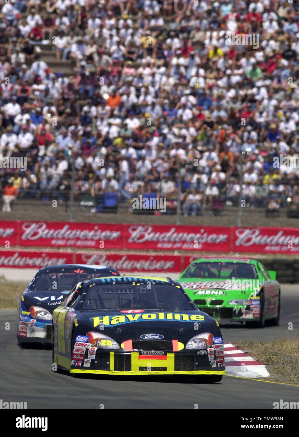 Jun 23, 2002; Sonoma, CA, EE.UU.; controlador Havoline Ricky Rudd, #28,  hace su camino a través de la S-vueltas entre 7 y 8 vueltas durante el  Dodge/Savemart 350 el domingo, 23 de
