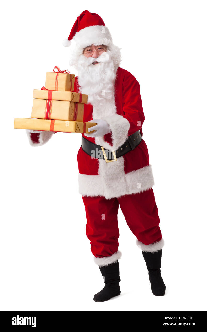 Santa Claus repartiendo regalos Fotografía de stock - Alamy