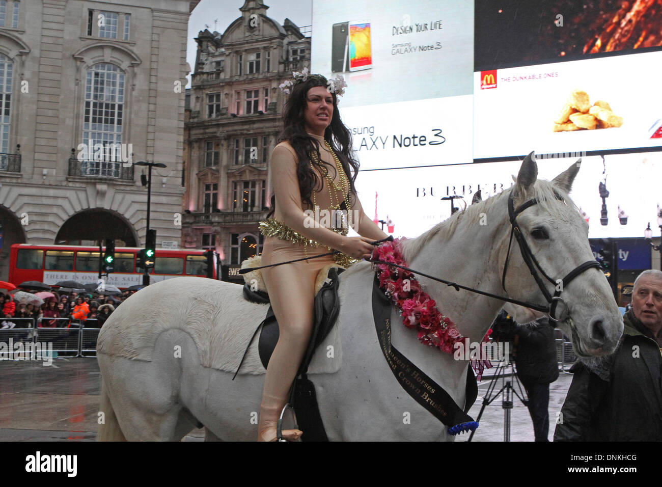 Londres, Reino Unido, 1 de enero de 2014,Lady Godiva a caballo en el Londres del desfile del Día de Año Nuevo de 2014. Crédito: Keith Larby/Alamy Live News Foto de stock