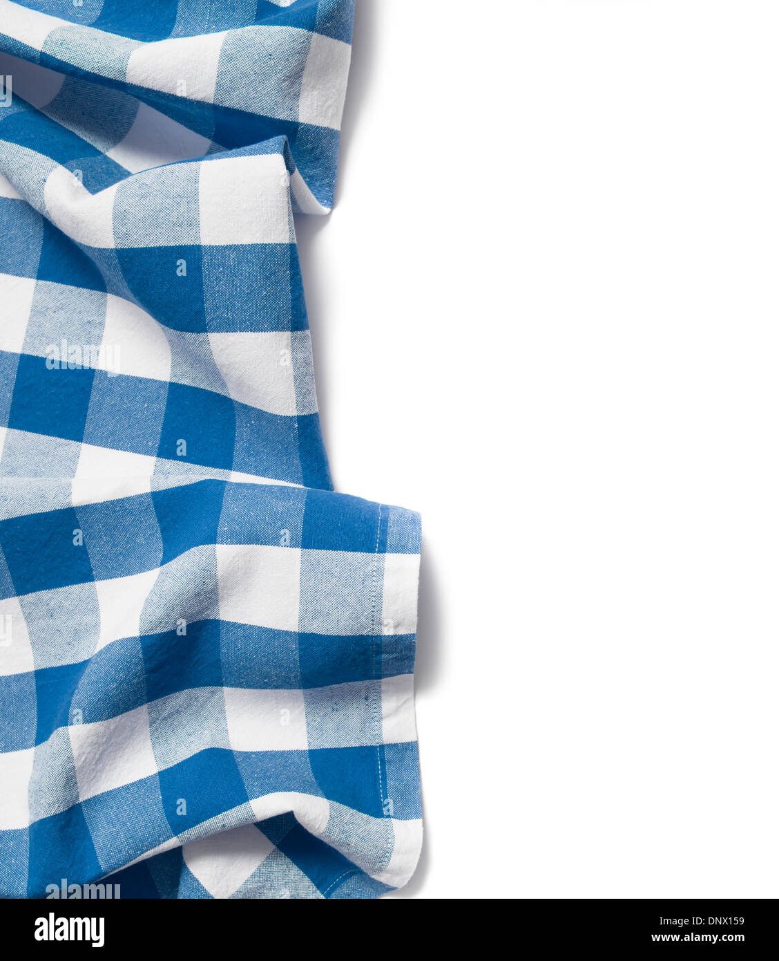Mantel doblado azul aislado en blanco Foto de stock