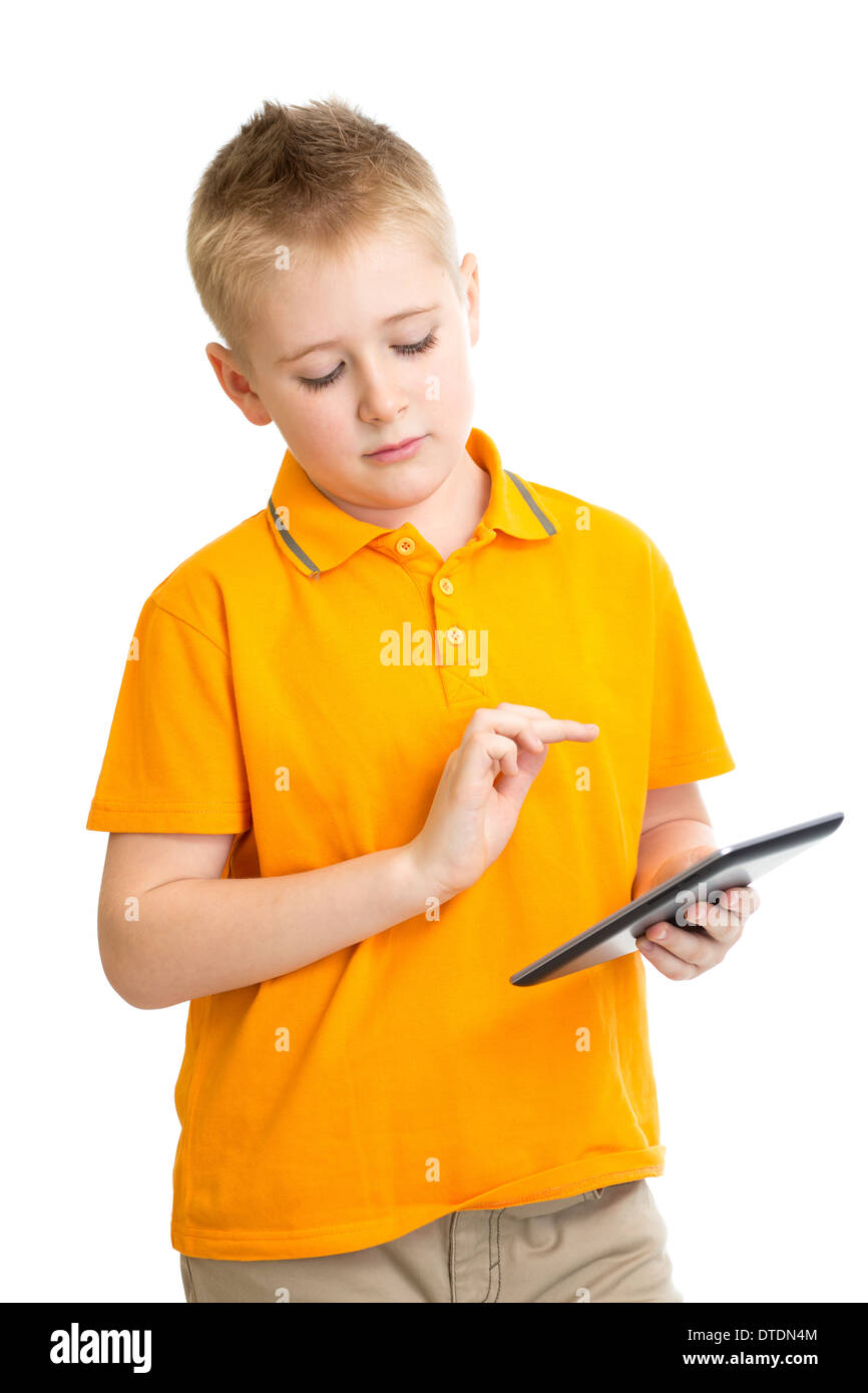 Pensativo kid boy con tablet pc o phablet aislado Foto de stock