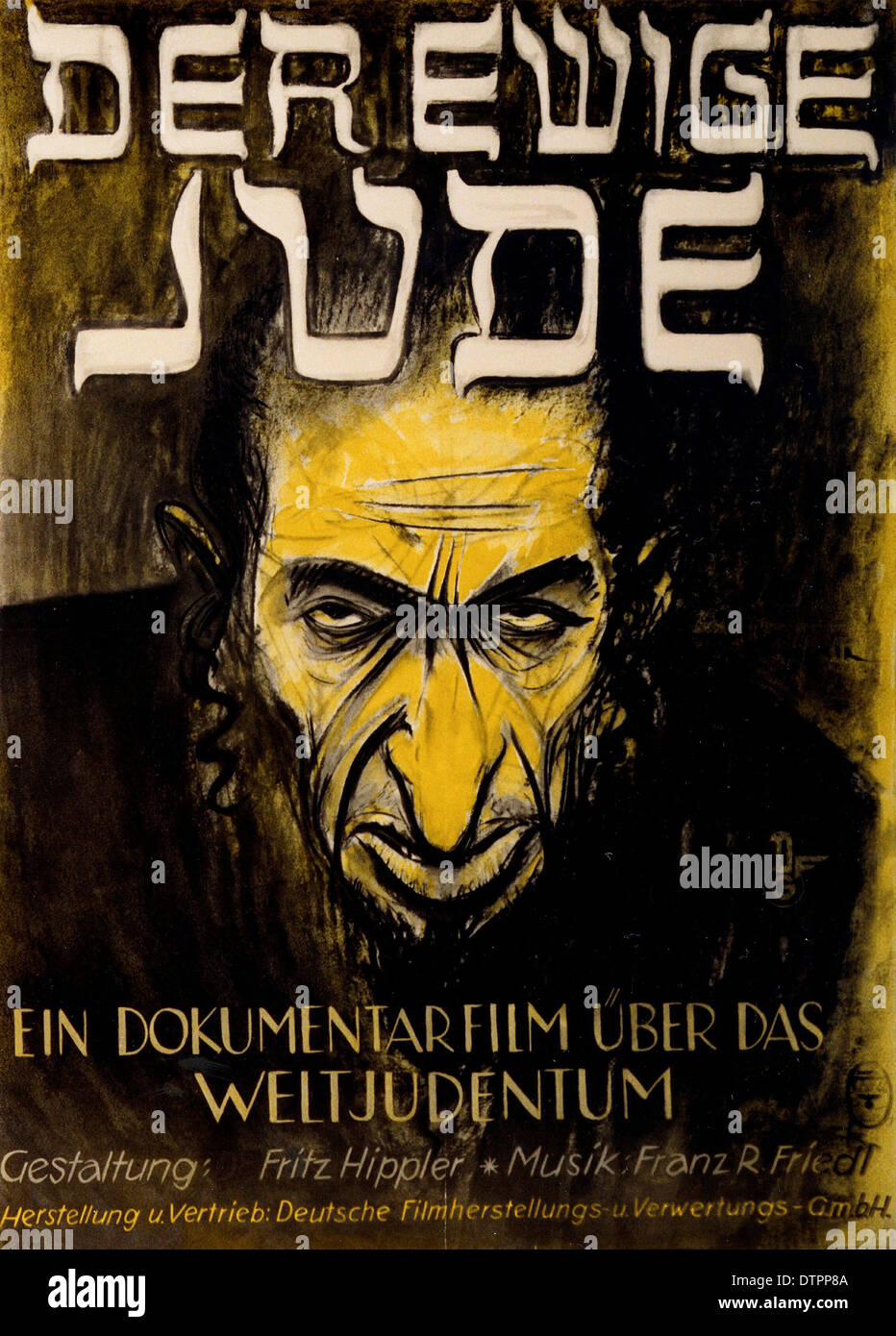 Póster de propaganda antisemita del régimen nazi alemán era en la cual el judío es mostrado como un hombre de aspecto feo, enojado con prominente nariz exagerada Foto de stock