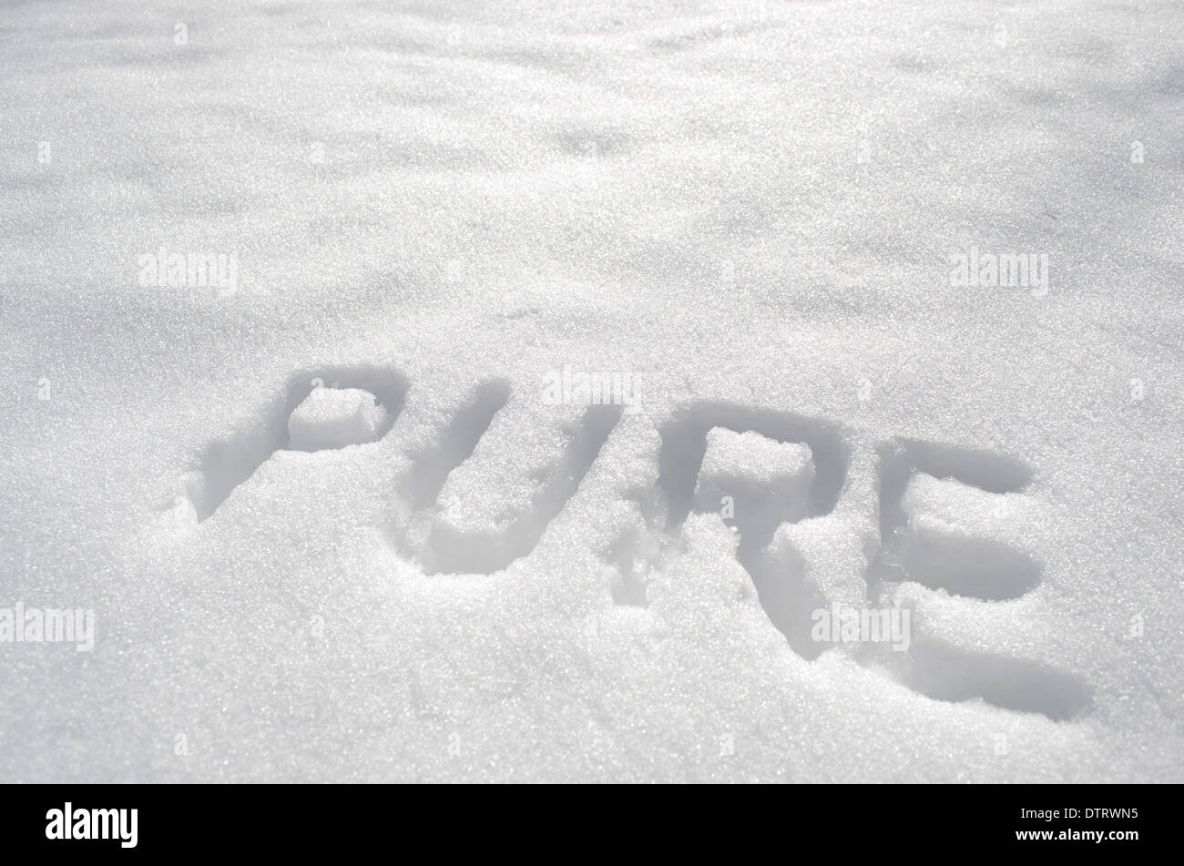 Escrito pura es la nieve. Foto de stock