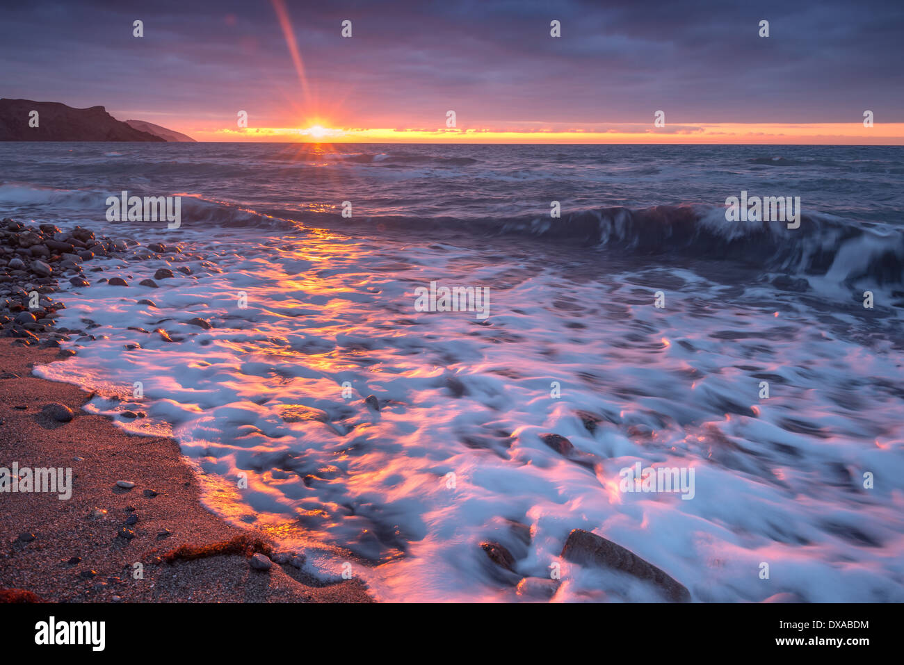 La playa de Sunset tiempo Foto de stock