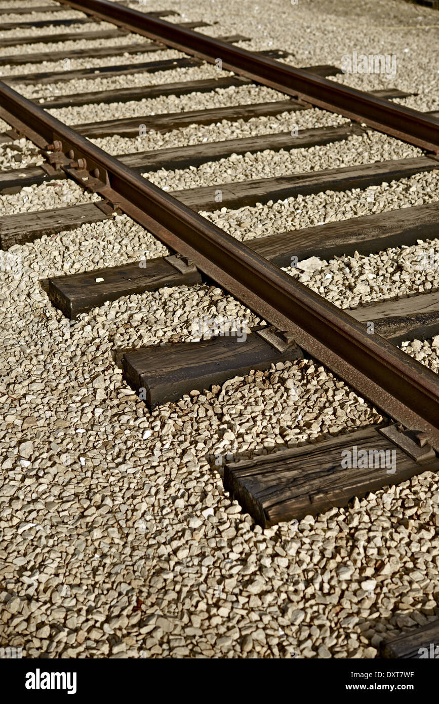 Las vías de ferrocarril Closeup fotografía vertical. Colección de fotos de ferrocarriles. Foto de stock