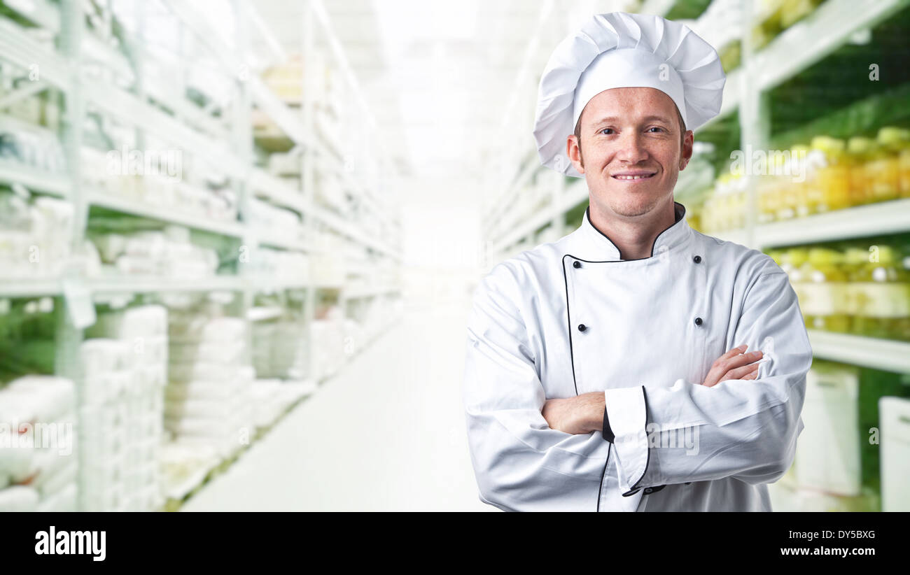 Retrato de chef y fondo de almacén Foto de stock