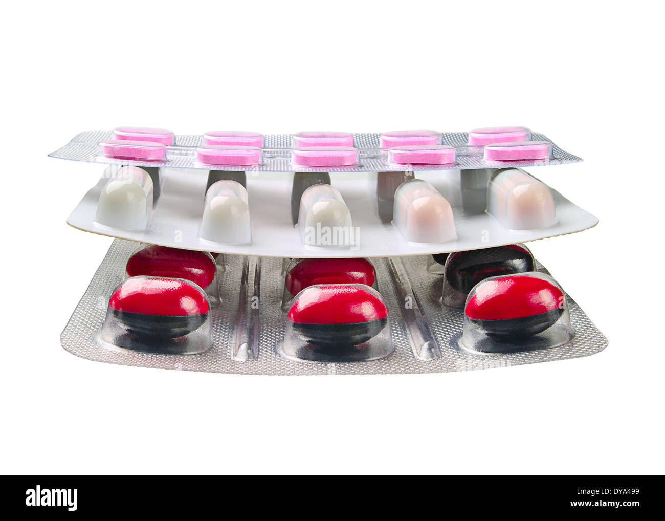 Los medicamentos en forma de tabletas y cápsulas aislado sobre un fondo blanco. Foto de stock
