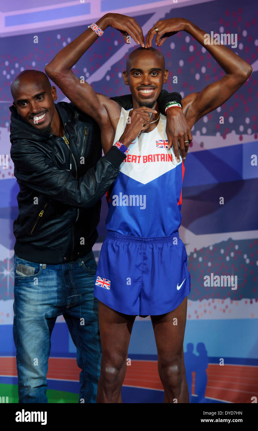 Mo Farah desvela sus nuevas figuras de cera en el Madame Tussauds de Londres. Foto de stock