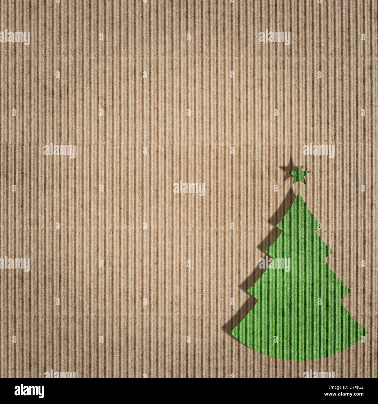 Papel reciclado con el verde de los árboles de Navidad. Concepto de tarjeta respetuosas con el medio ambiente. Textura del papel. Foto de stock
