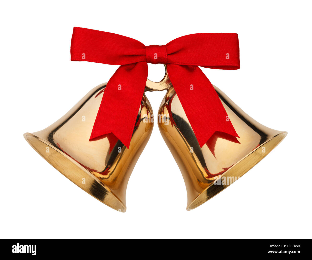 Campanas de oro con una cinta roja Bow aislado sobre fondo blanco. Foto de stock