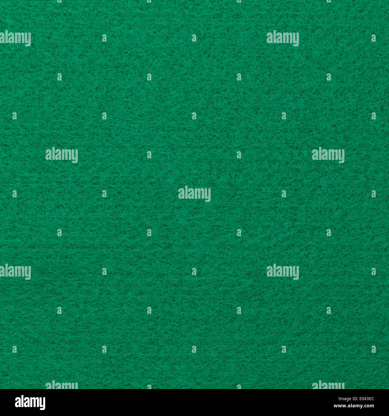 Textura del fondo cuadrado de fieltro verde. Foto de stock
