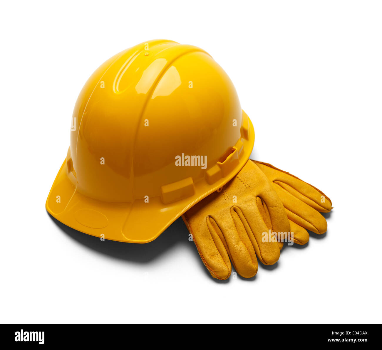 Construcción de casco y guantes de trabajo de cuero aislado sobre fondo blanco. Foto de stock