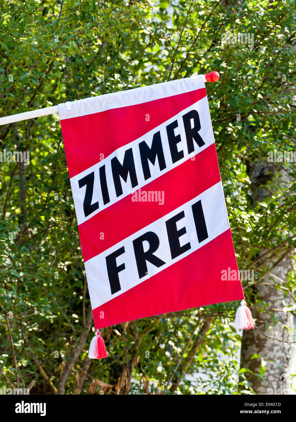 Bandera con habitación libremente en el turismo, Fahne mit Zimmer frei Tourismus im Foto de stock