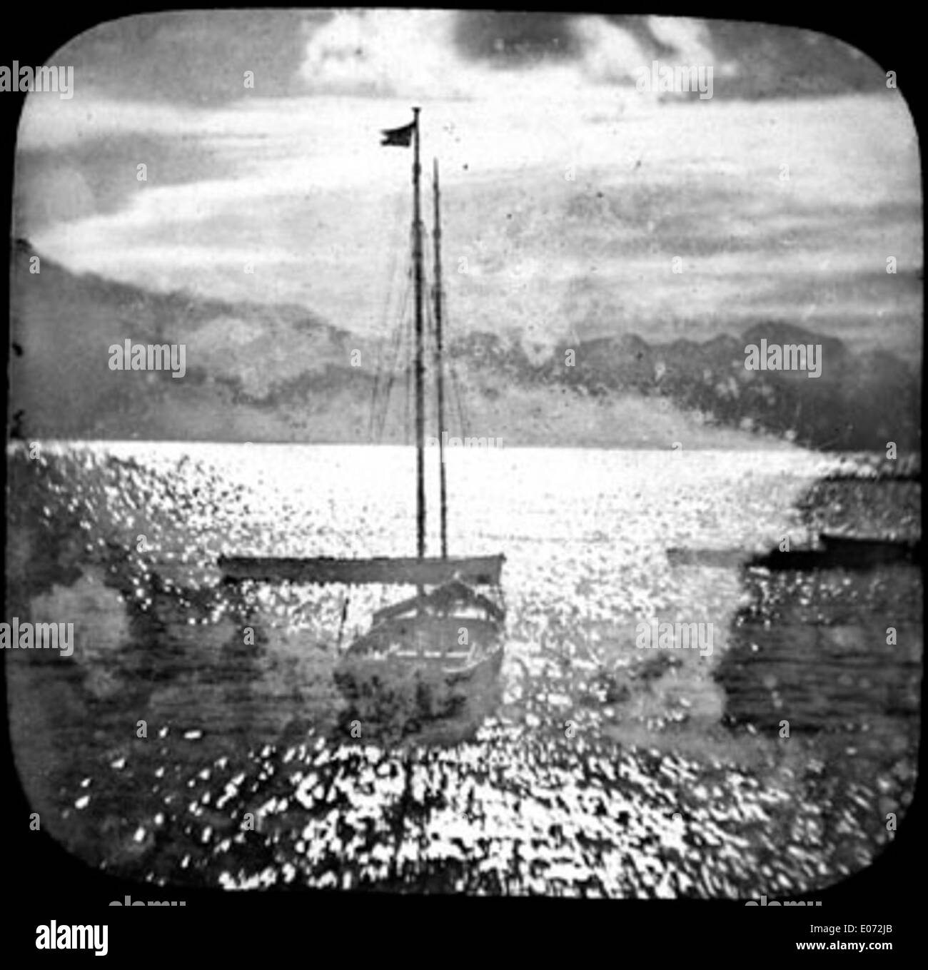 Barca sur le lac de Genève au coucher du soleil Foto de stock