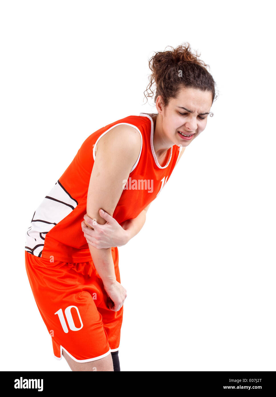 El jugador de baloncesto mujer con el dolor de codo Foto de stock
