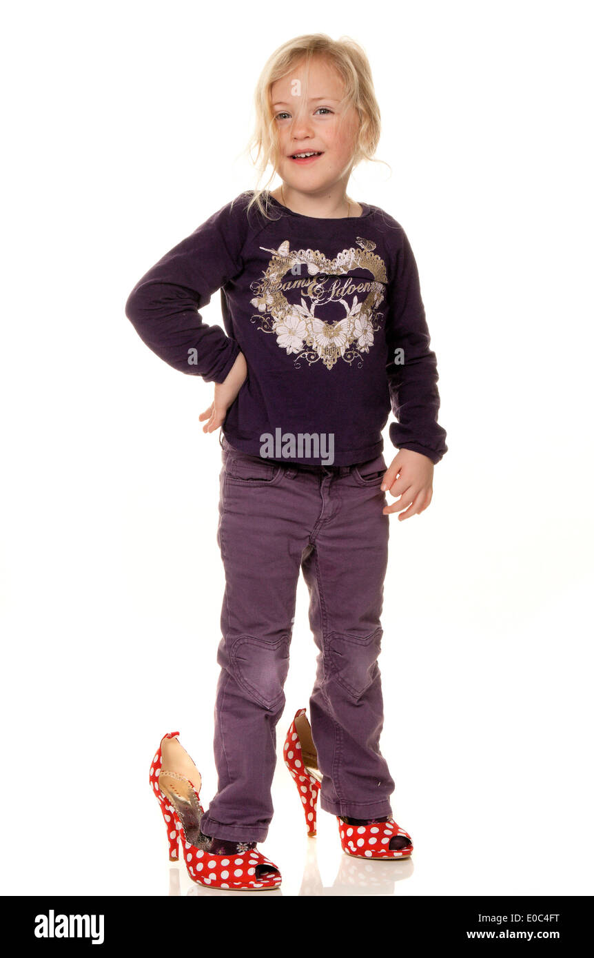 Girl with big shoes fotografías e imágenes de alta resolución - Alamy