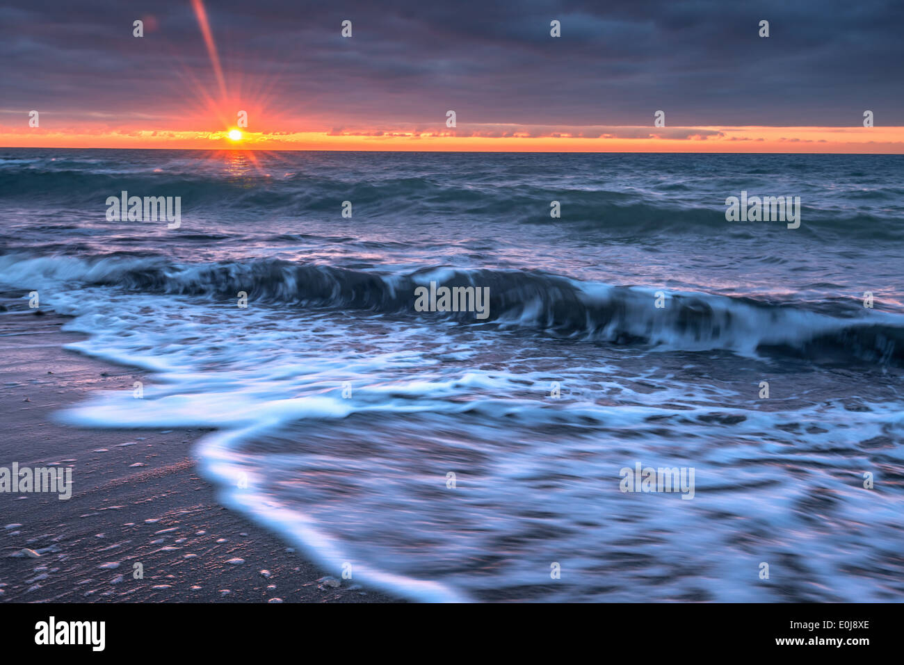 La playa de Sunset tiempo Foto de stock