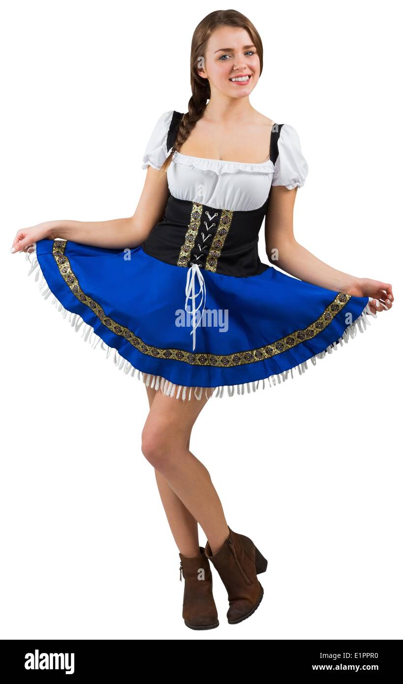 Oktoberfest chica extendiendo su falda Foto de stock