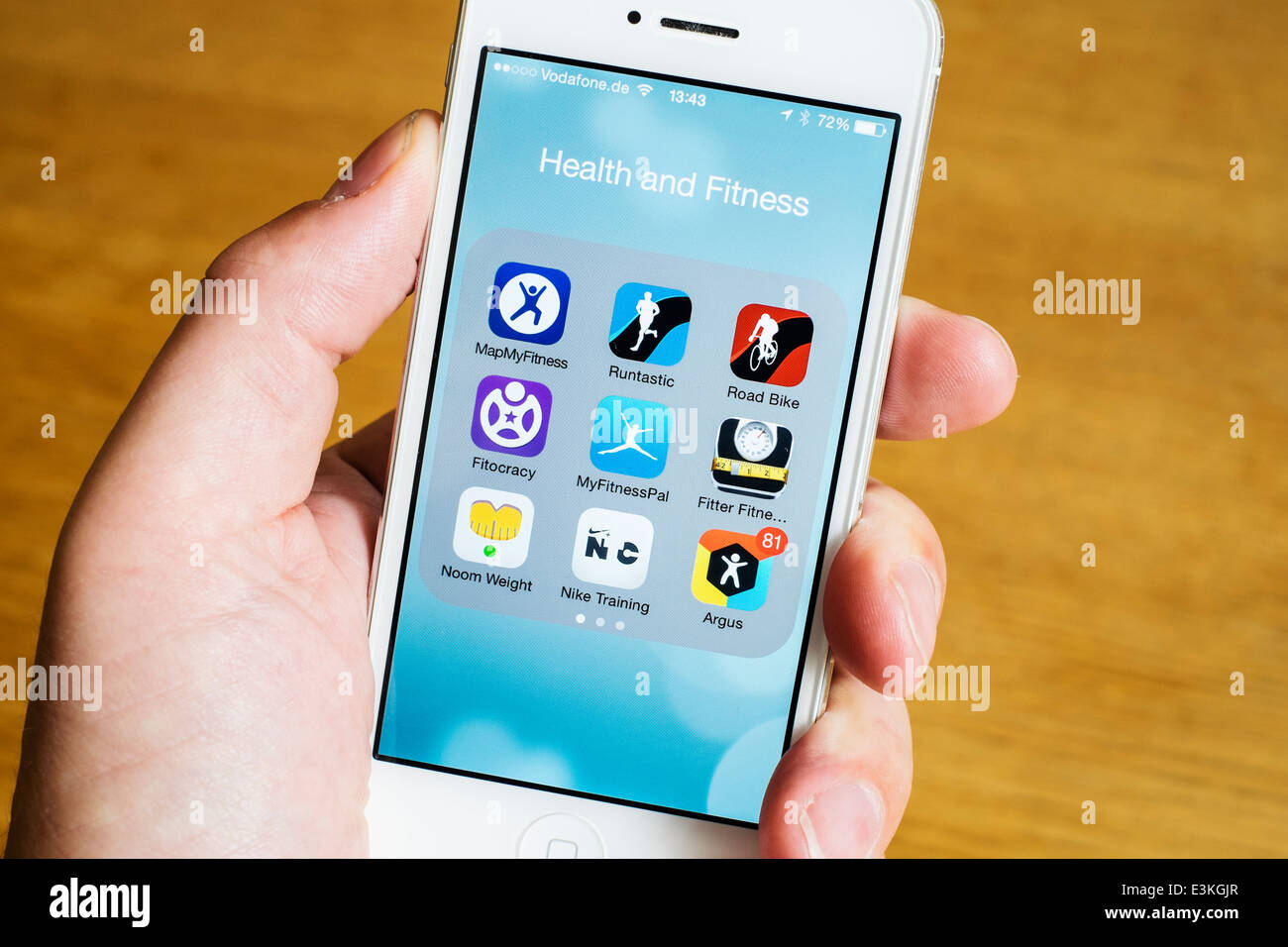 Detalle de muchos centros de salud, deporte y fitness iPhone Apps en un teléfono inteligente. Foto de stock