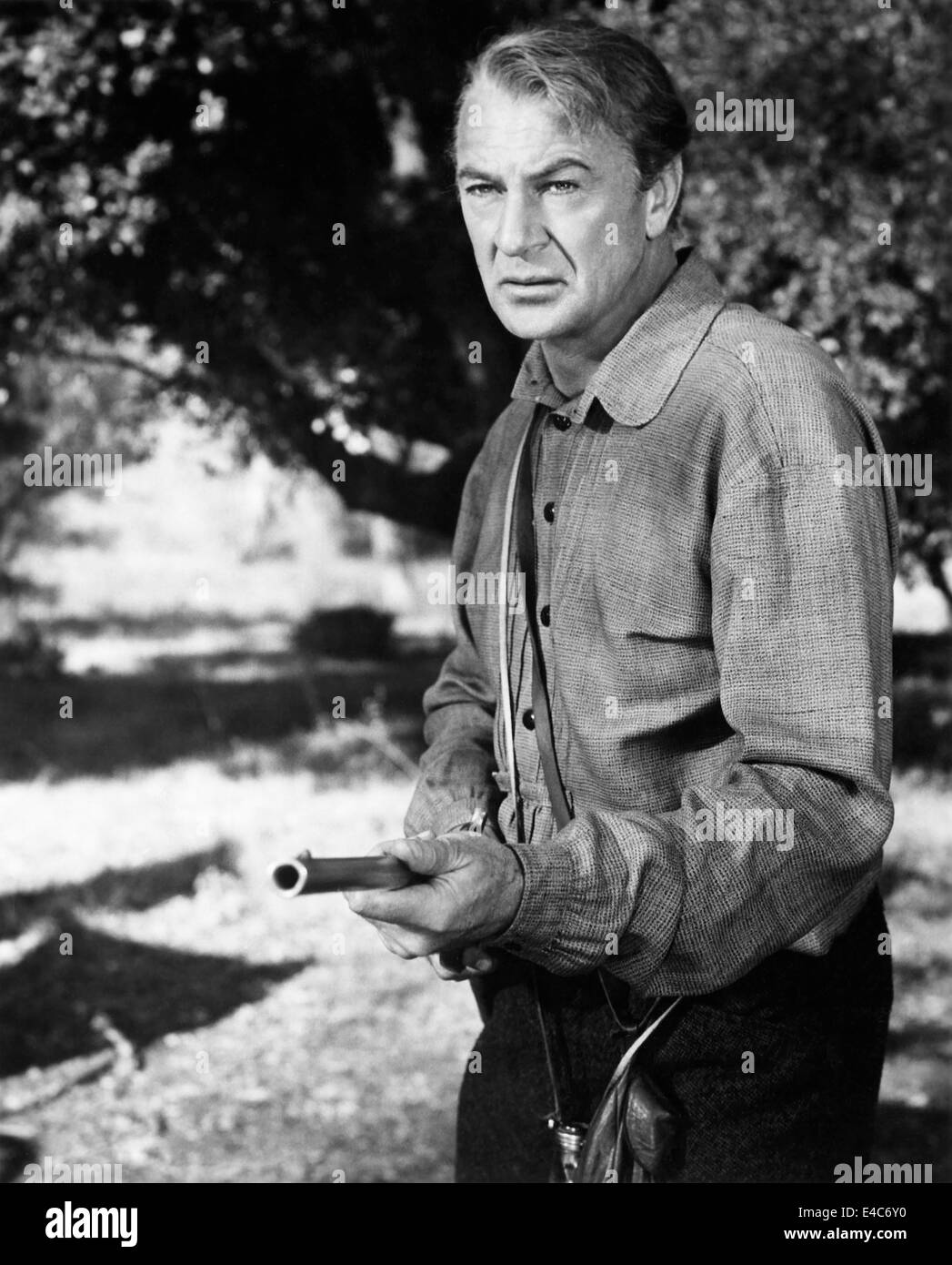 Gary Cooper, en el plató de la película, "persuasión amistosa", 1956 Foto de stock