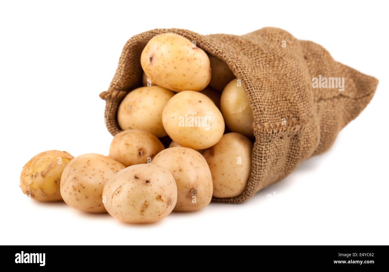 Sacos de arpillera con patata Foto de stock