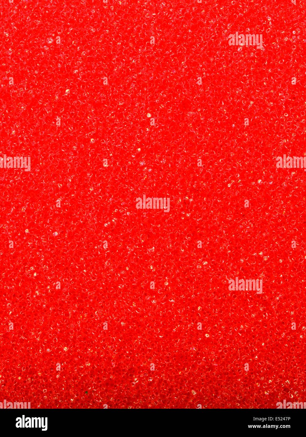 Esponja de espuma de celulosa textura roja antecedentes Foto de stock