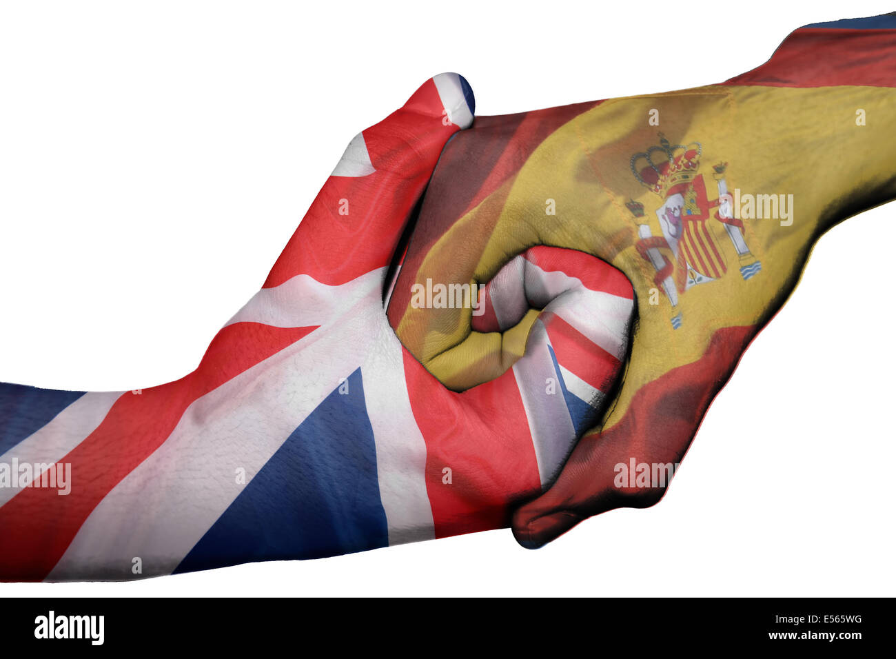 Enlace diplomático entre países: las banderas de España y Reino Unido las dos manos sobreimpresos Foto de stock