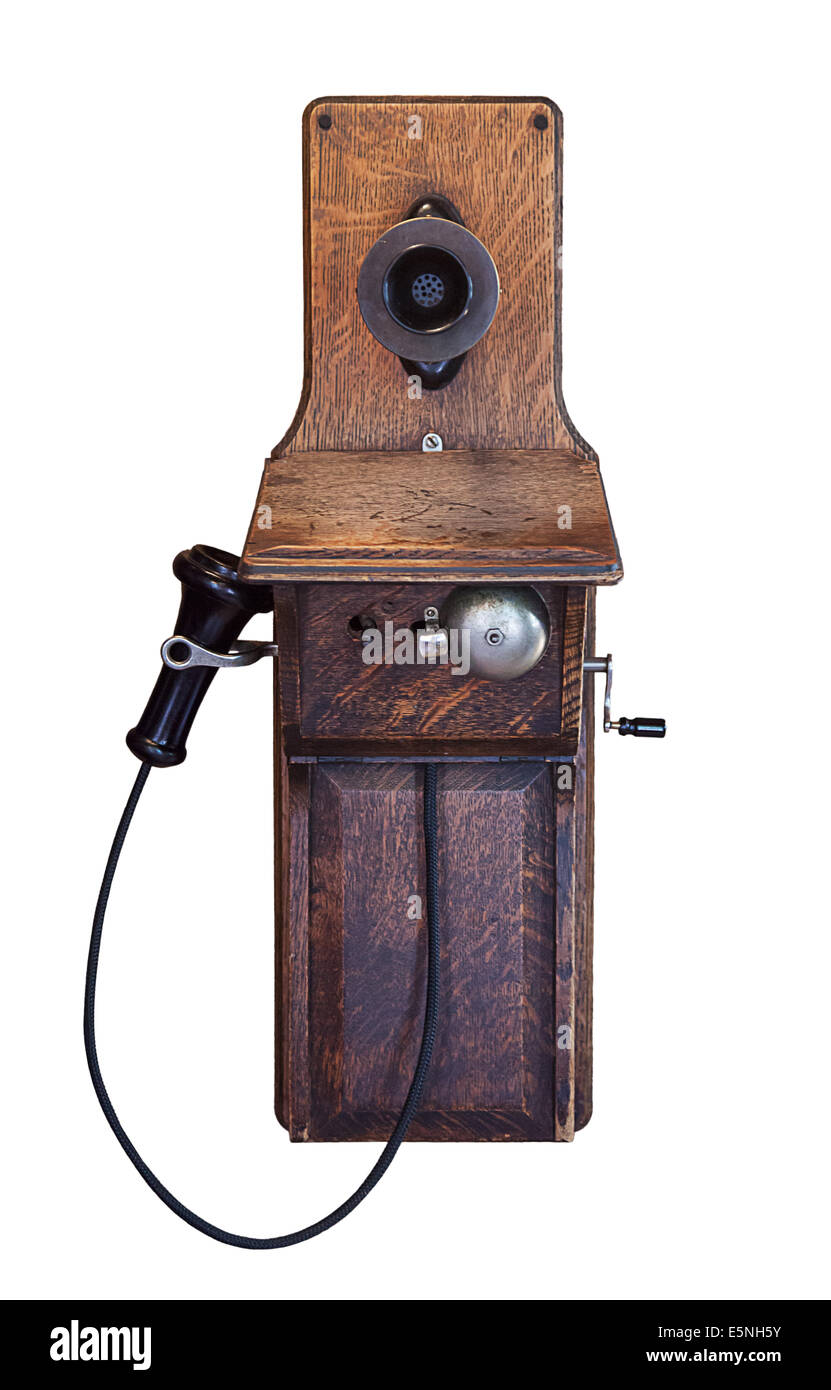 Muy antiguo teléfono de madera en la pared Foto de stock