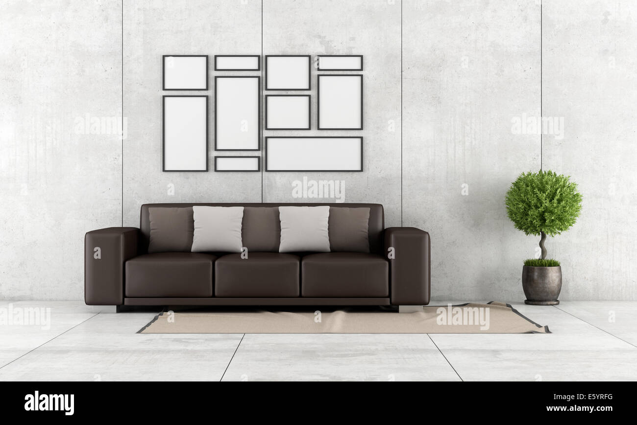 Sofá de color marrón con cojín en una habitación de hormigón minimalista - rendering Foto de stock